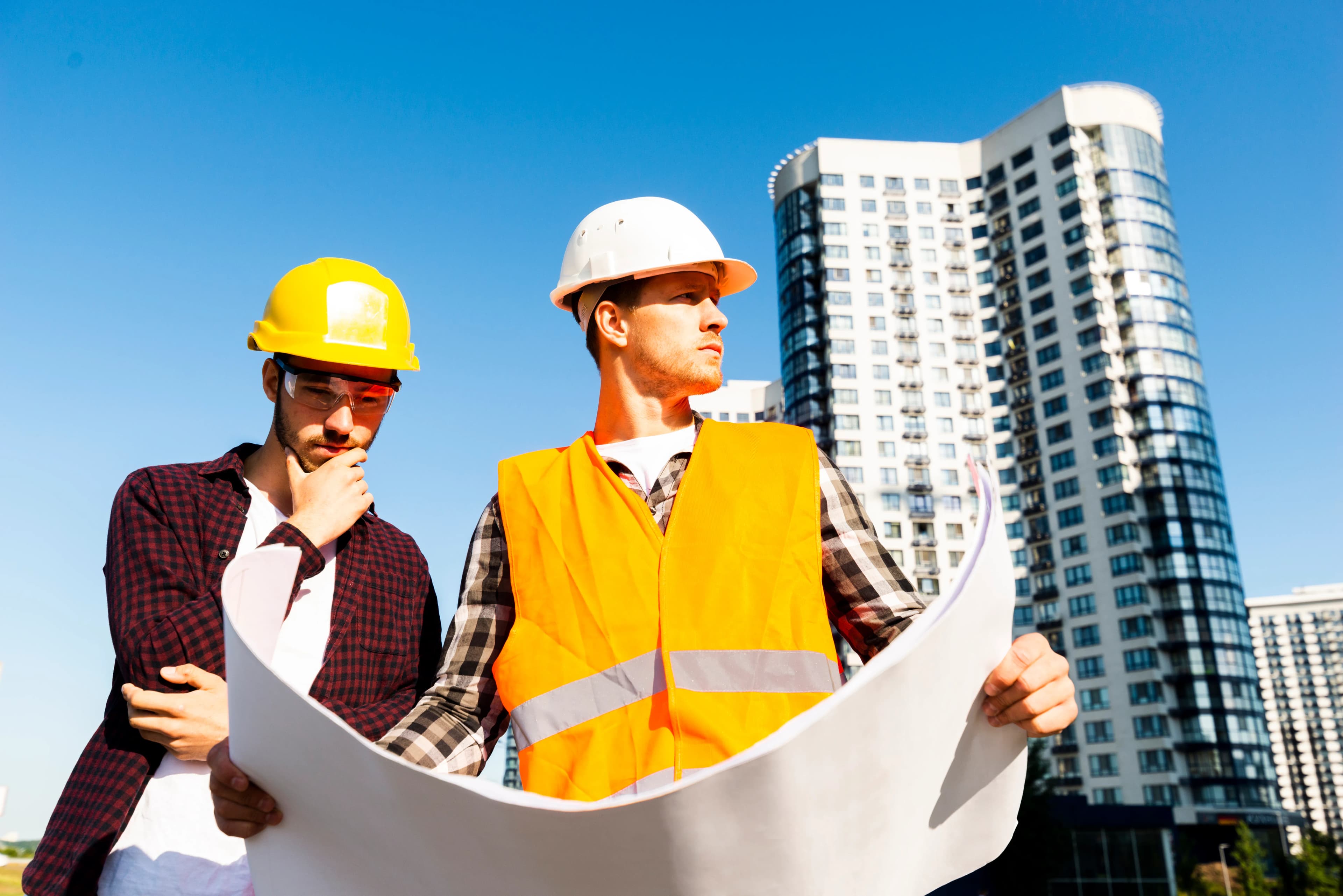 Civil engineers working on infrastructure design with 3D modeling software